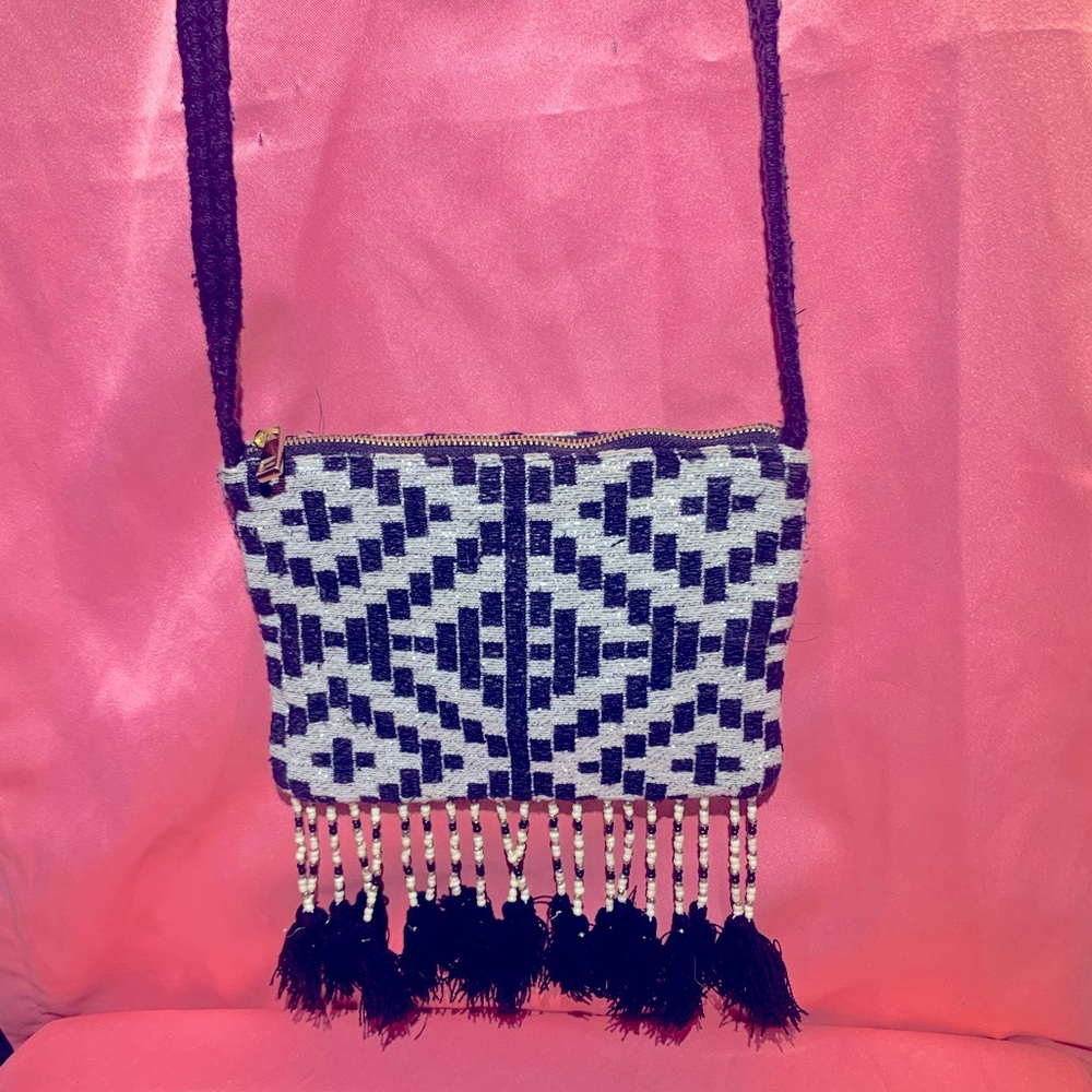 Moreno woven crossbody bag.